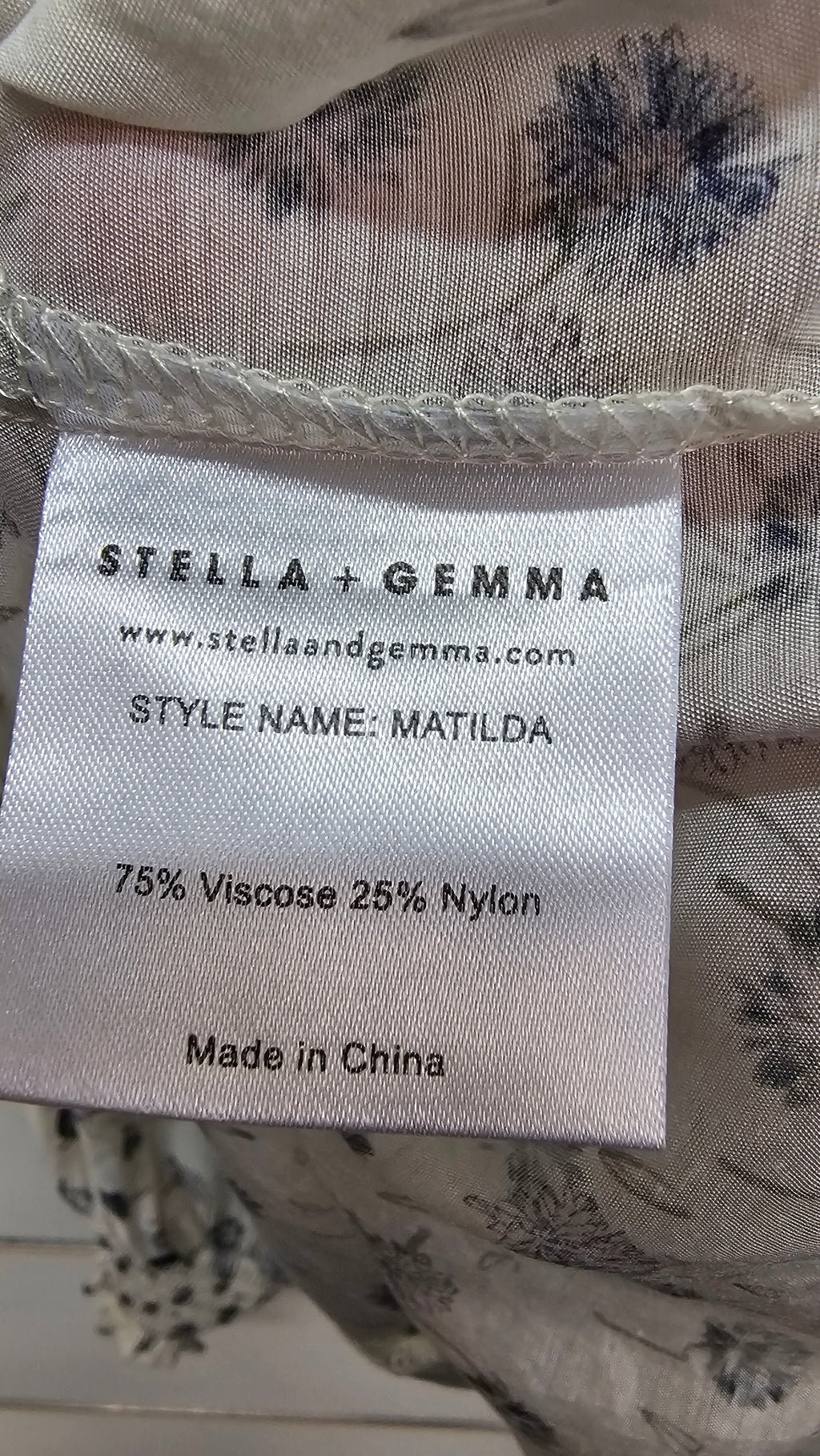 Stella & Gemma Floral Long-Sleeve Top with Smocked Cuffs and Ruffle Hem - 16